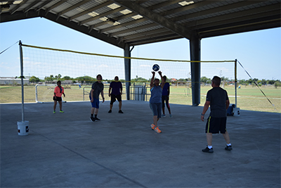 Group playing volleyball at Salinas Park.